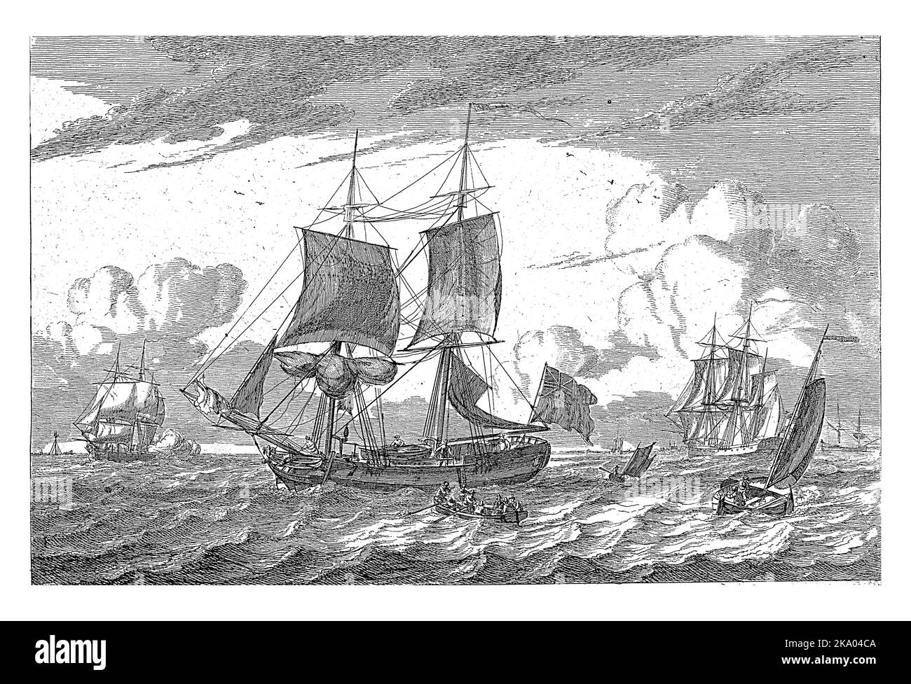 Plusieurs bateaux à voile sur l'eau bâclée. Au premier plan, deux maîtres avec un drapeau anglais. Il y a une boucle sur le pont du bateau. Banque D'Images
