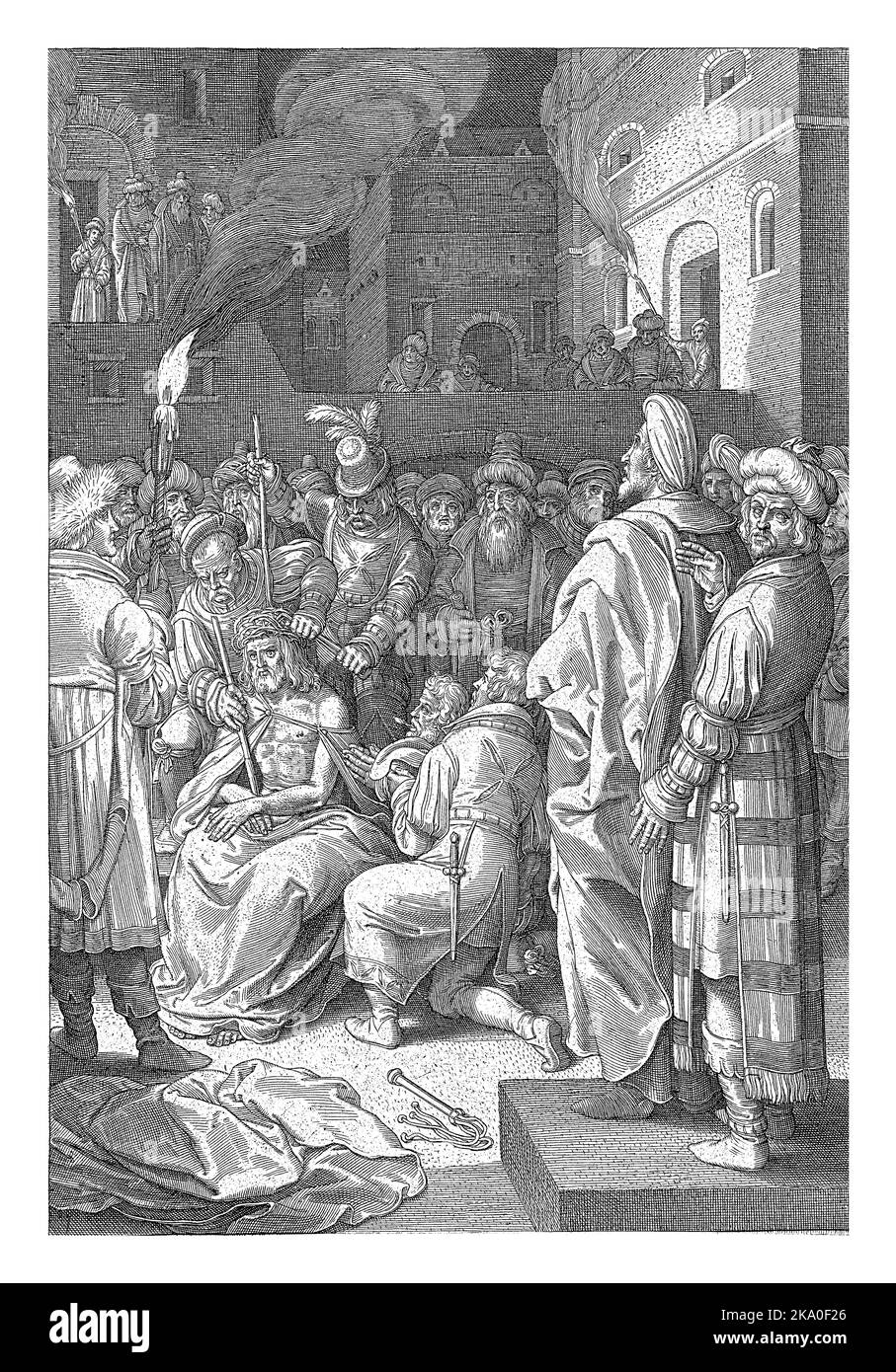 Couronnement du Christ, Nicolaes de Bruyn, 1618 Christ est assis parmi les soldats sur la place du palais de justice de Pilate. Il porte un manteau et est donné un faux sc Banque D'Images