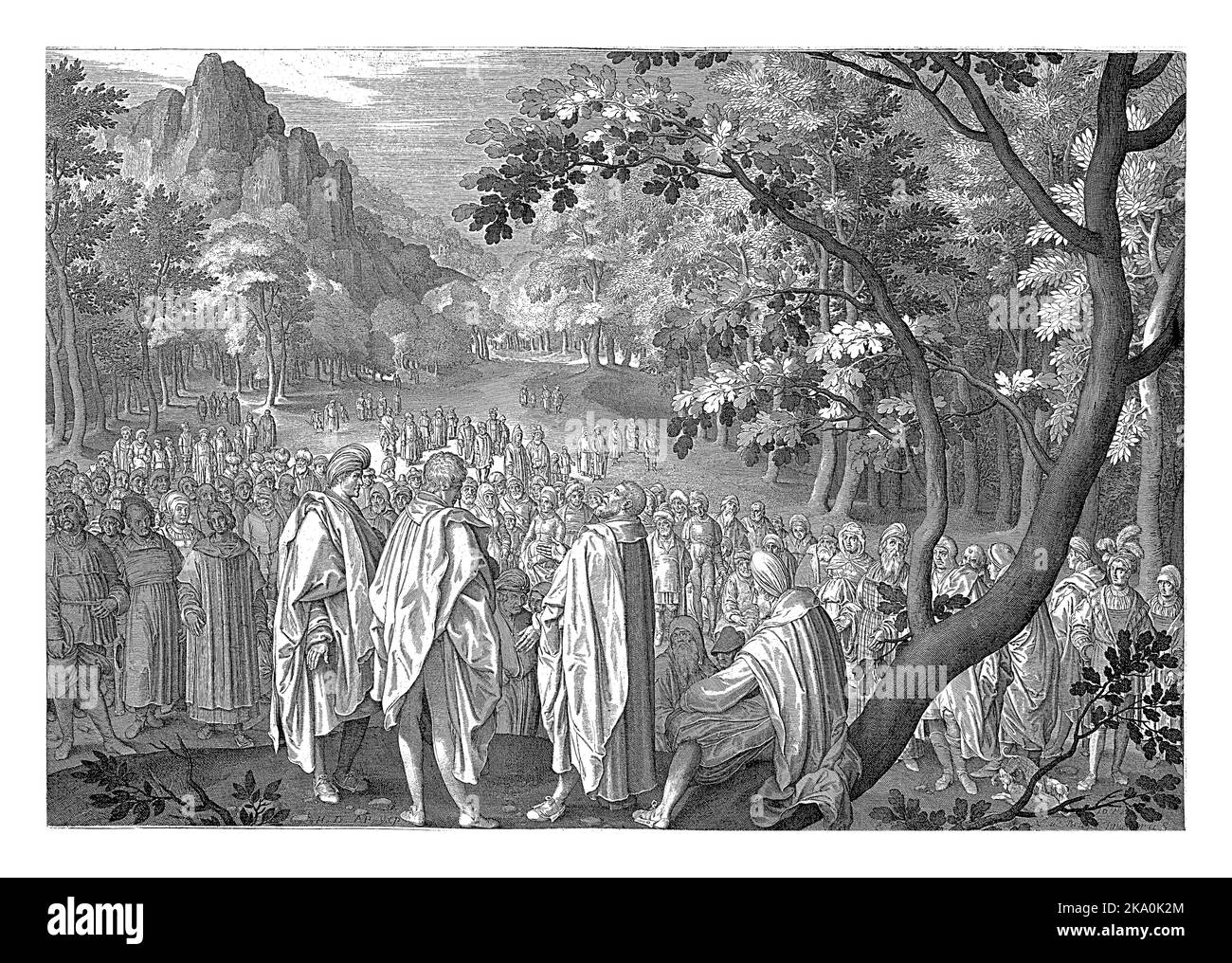 Quatre apôtres prêchent dans le désert à une foule de croyants. Banque D'Images