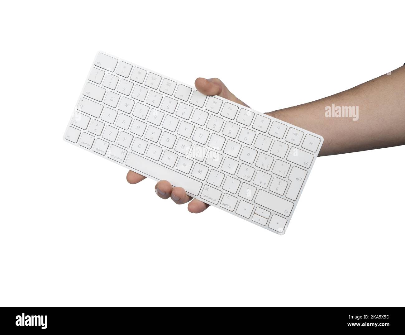 un clavier dans une main mâle sur un fond transparent Banque D'Images