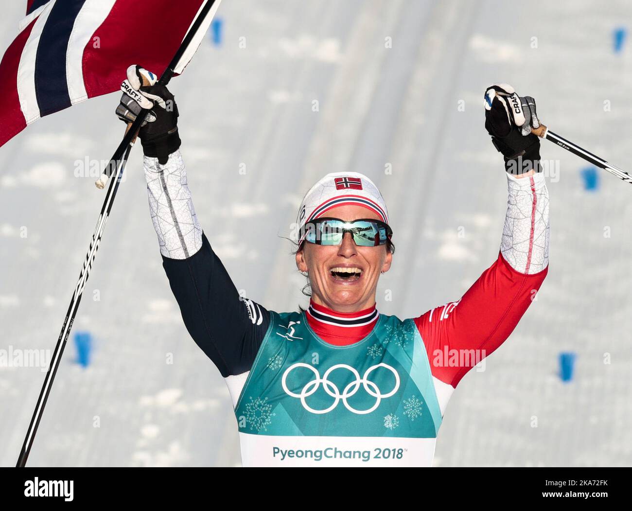 Marit Bjoergen, de Norvège, célèbre après avoir remporté la médaille d'or de la compétition féminine de ski de fond 30k aux Jeux olympiques d'hiver de 2018 à Pyeongchang, en Corée du Sud, le dimanche 25 février 2018. Photo: Lise Aaserud / NTB scanpi Banque D'Images