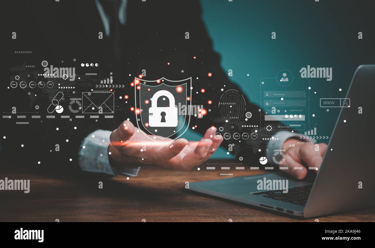 Sécurité du réseau Internet, homme d'affaires utilisant un ordinateur portable et tenant les icônes de verrouillage de cyber-sécurité. Banque D'Images