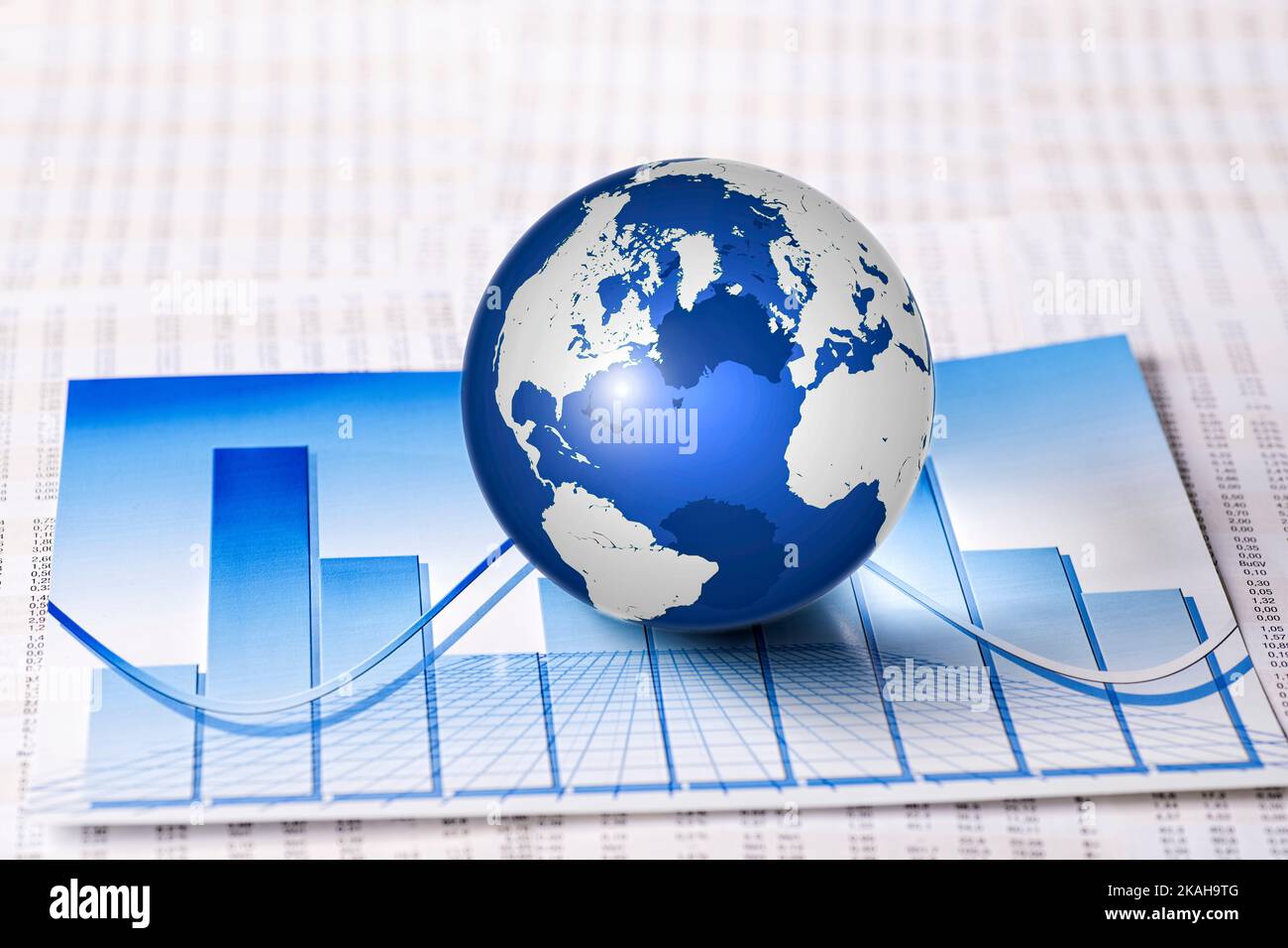 Globe avec des tableaux de taux de change et un graphique à barres symbolisant le développement de l'économie Banque D'Images