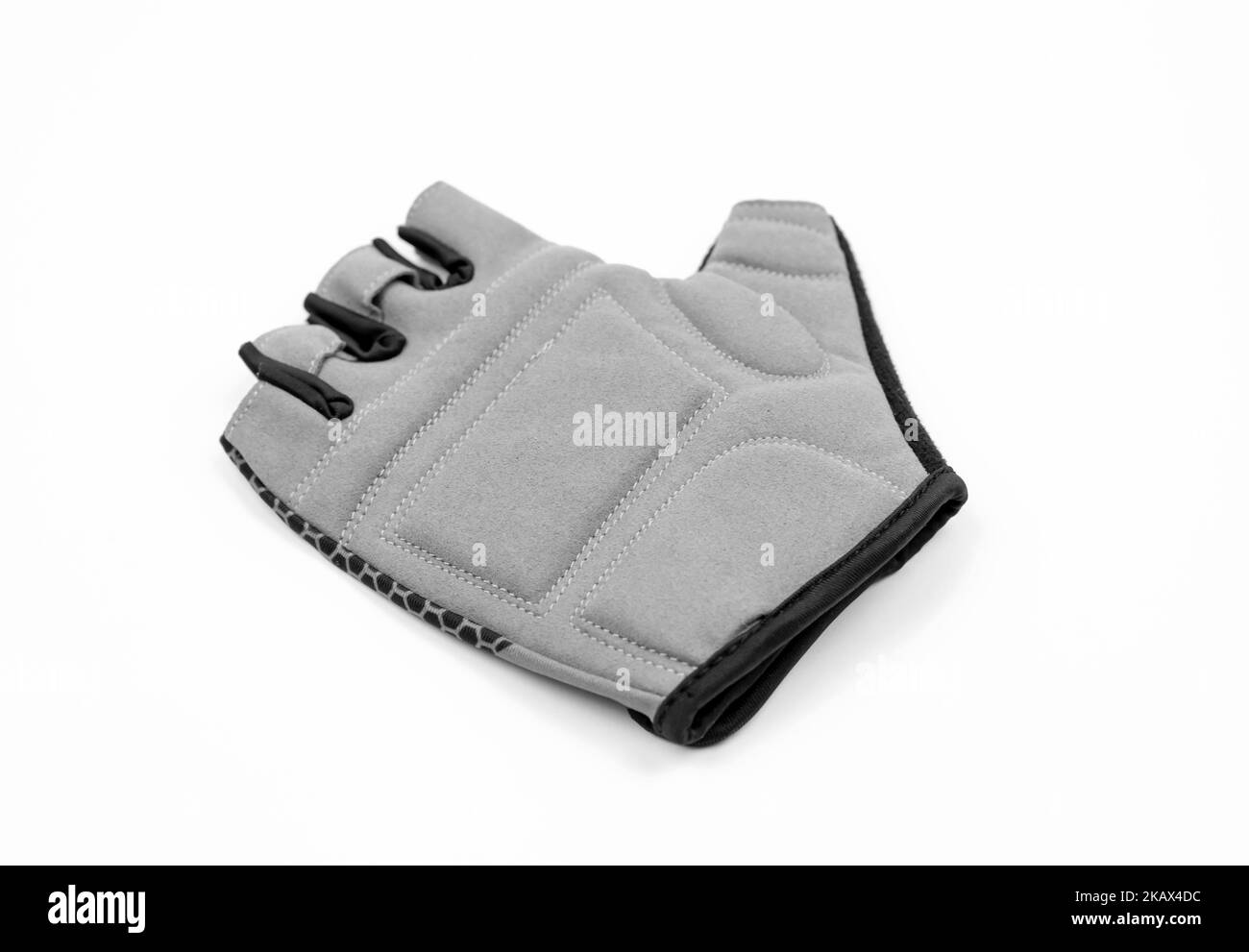 Gant de sport sans doigts sur fond blanc. Gant de cyclisme Banque D'Images