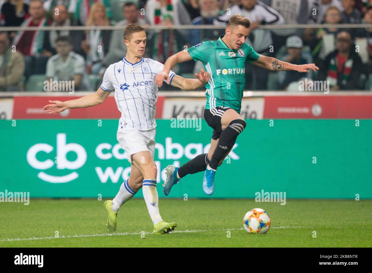 Robert Gumny (Lech), Arvydas Novikovas (Legia) pendant le match PKO Ekstraklasa entre Legia Varsovie et Lech Poznan, à Varsovie, Pologne, sur 19 octobre 2019. (Photo par Foto Olimpik/NurPhoto) Banque D'Images