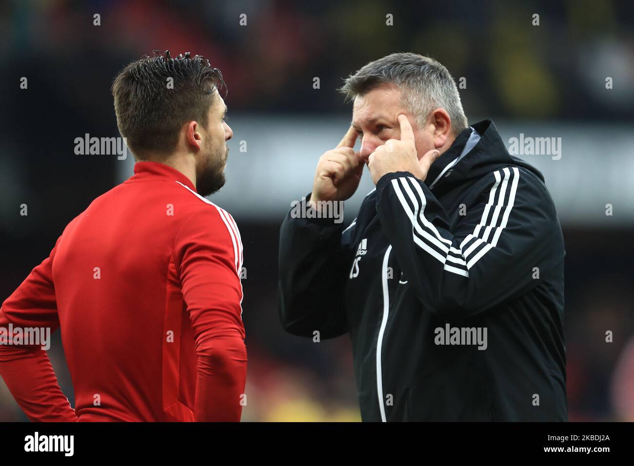 L'entraîneur assistant de Watfords Craig Shakespeare discuse des tactiques avec Watfords Kiko Femenia lors du match de Premier League entre Watford et Aston Villa à Vicarage Road, Watford, le samedi 28th décembre 2019. (Photo de Leila Coker/MI News/NurPhoto) Banque D'Images