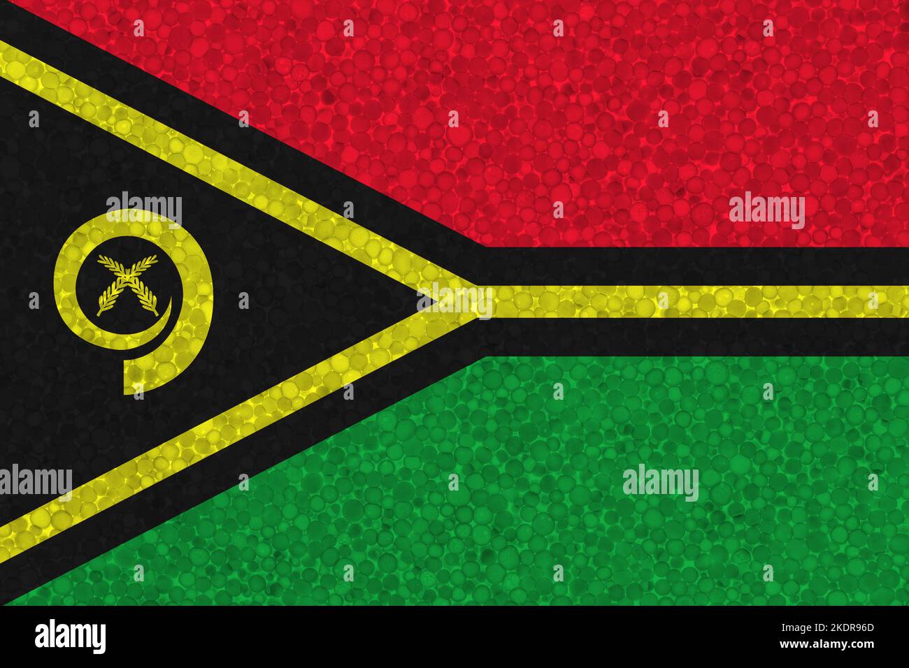 Drapeau de Vanuatu sur la texture de la styromousse. Drapeau national peint sur la surface de la mousse plastique Banque D'Images