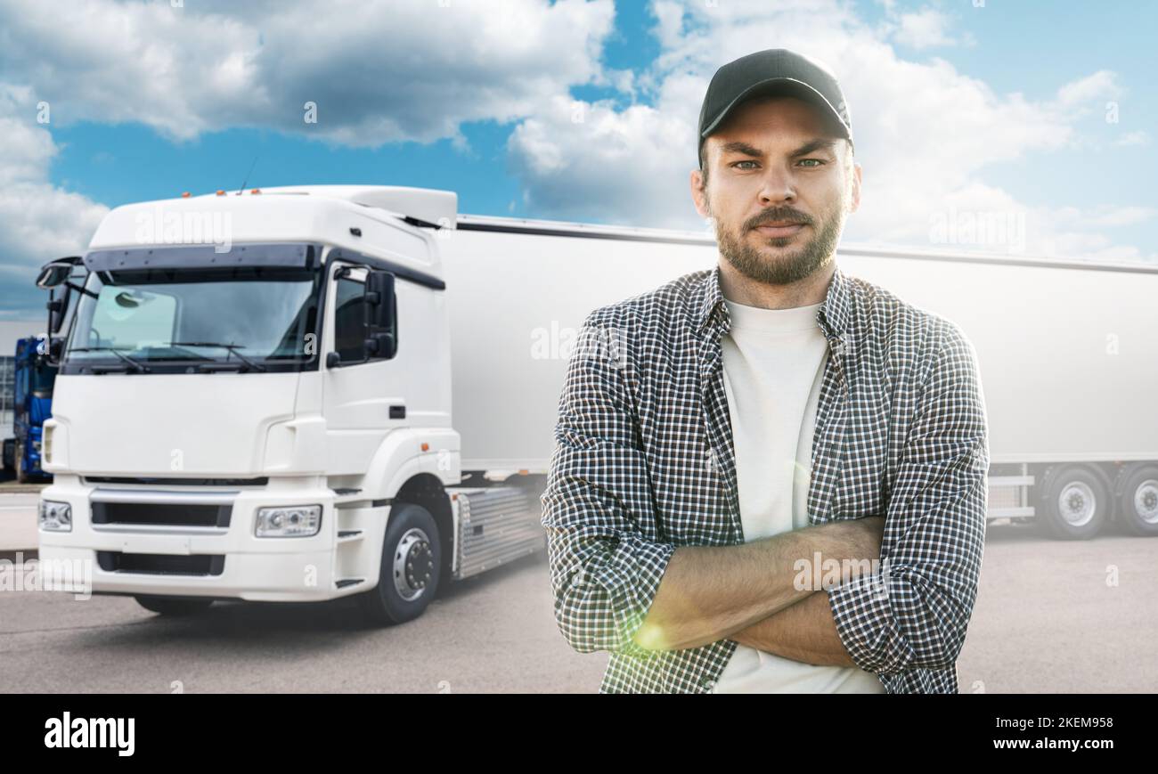 Conducteur de camion debout devant les camions Banque D'Images