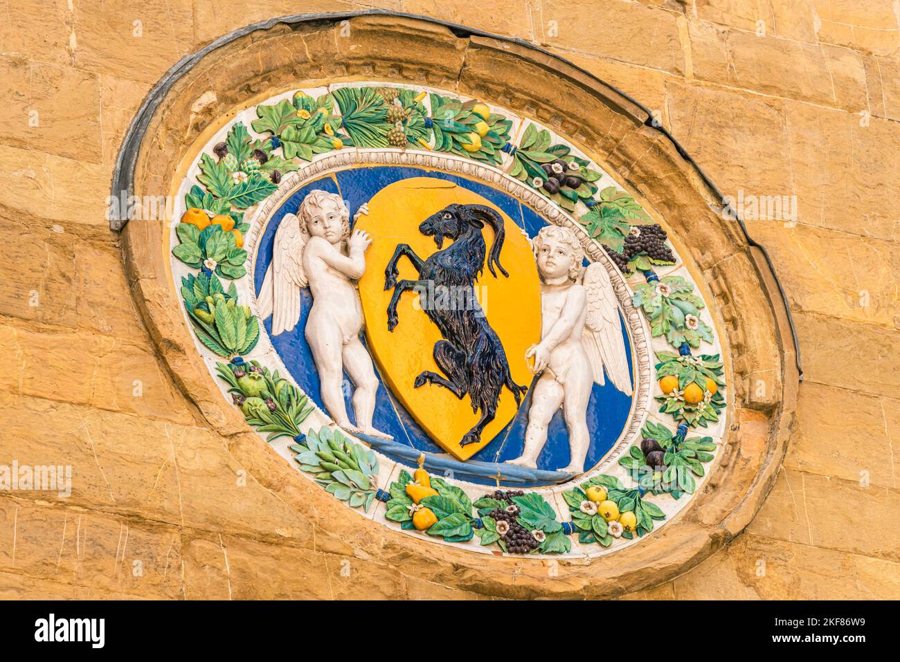 Tondo avec les armoiries de l'Arte dei Beccai, église d'Orsanmichele, Florence, Italie, Europe Banque D'Images