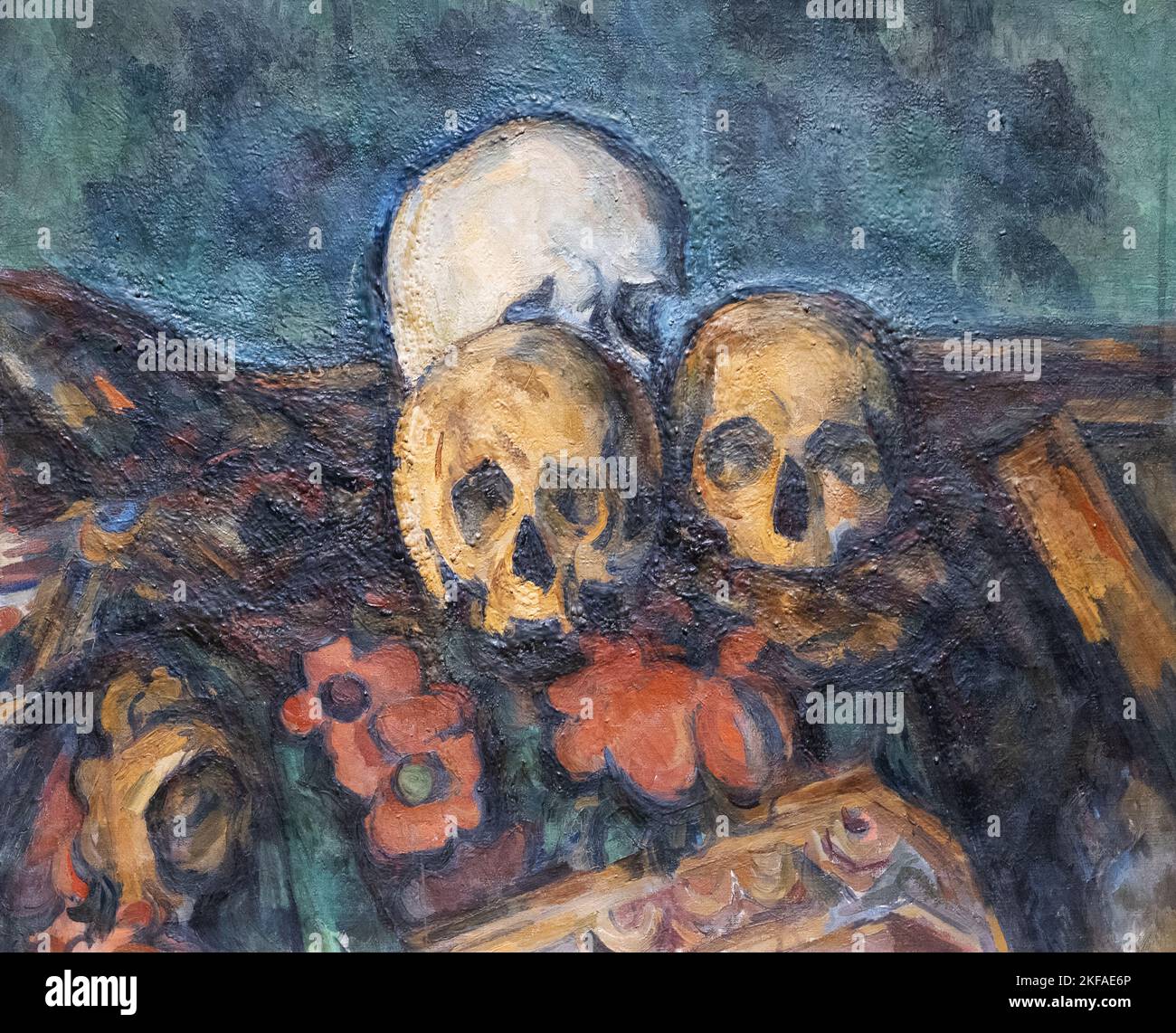 Paul Cézanne peinture encore à la vie, trois crânes sur un tapis à motifs, 1904; peintures impressionnistes de poste de 20th siècles. Banque D'Images