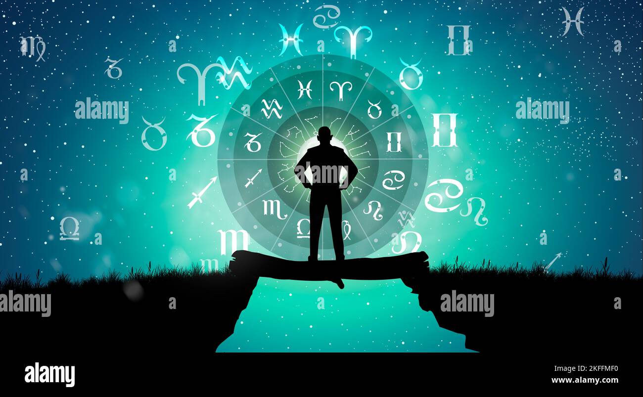 Signes astrologiques du zodiaque à l'intérieur du cercle de l'horoscope. Silhouette d'homme consultant les étoiles et la lune sur la roue du zodiaque et le fond de la voie laiteuse. Banque D'Images