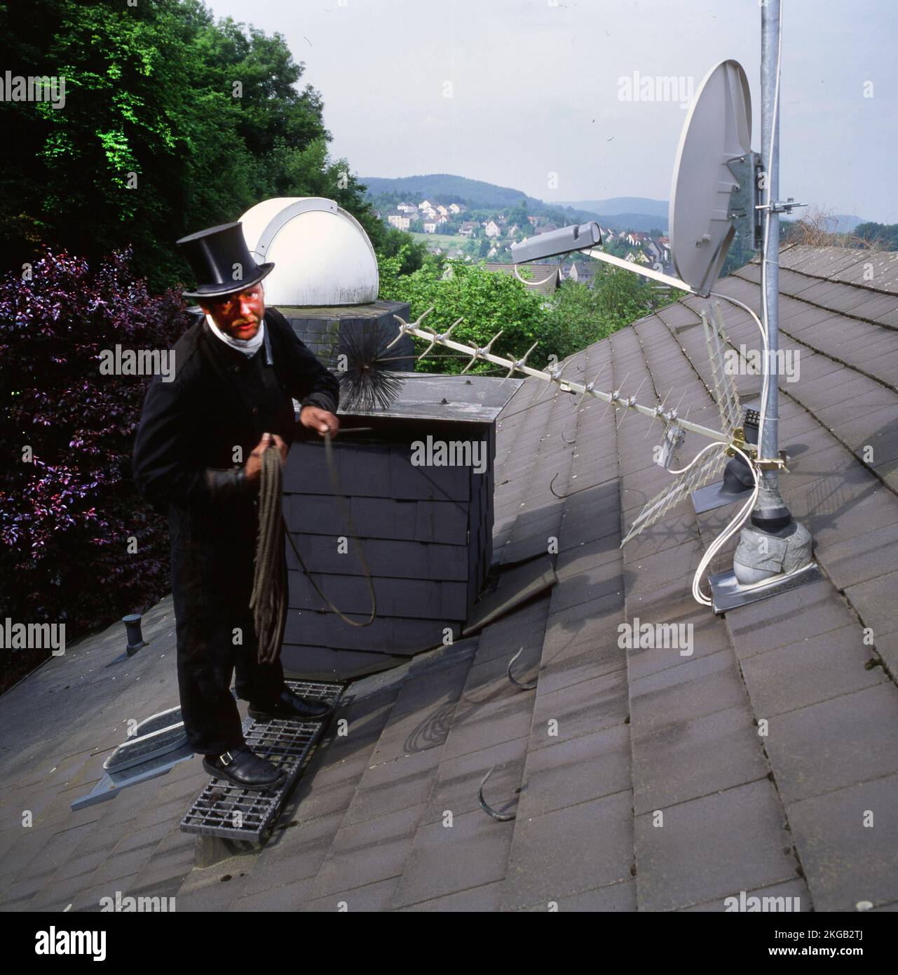 Balayage de cheminée en formation professionnelle et pose dans un studio photo, ici sur 5.05.1992 à Iserlohn, Allemagne, Europe Banque D'Images