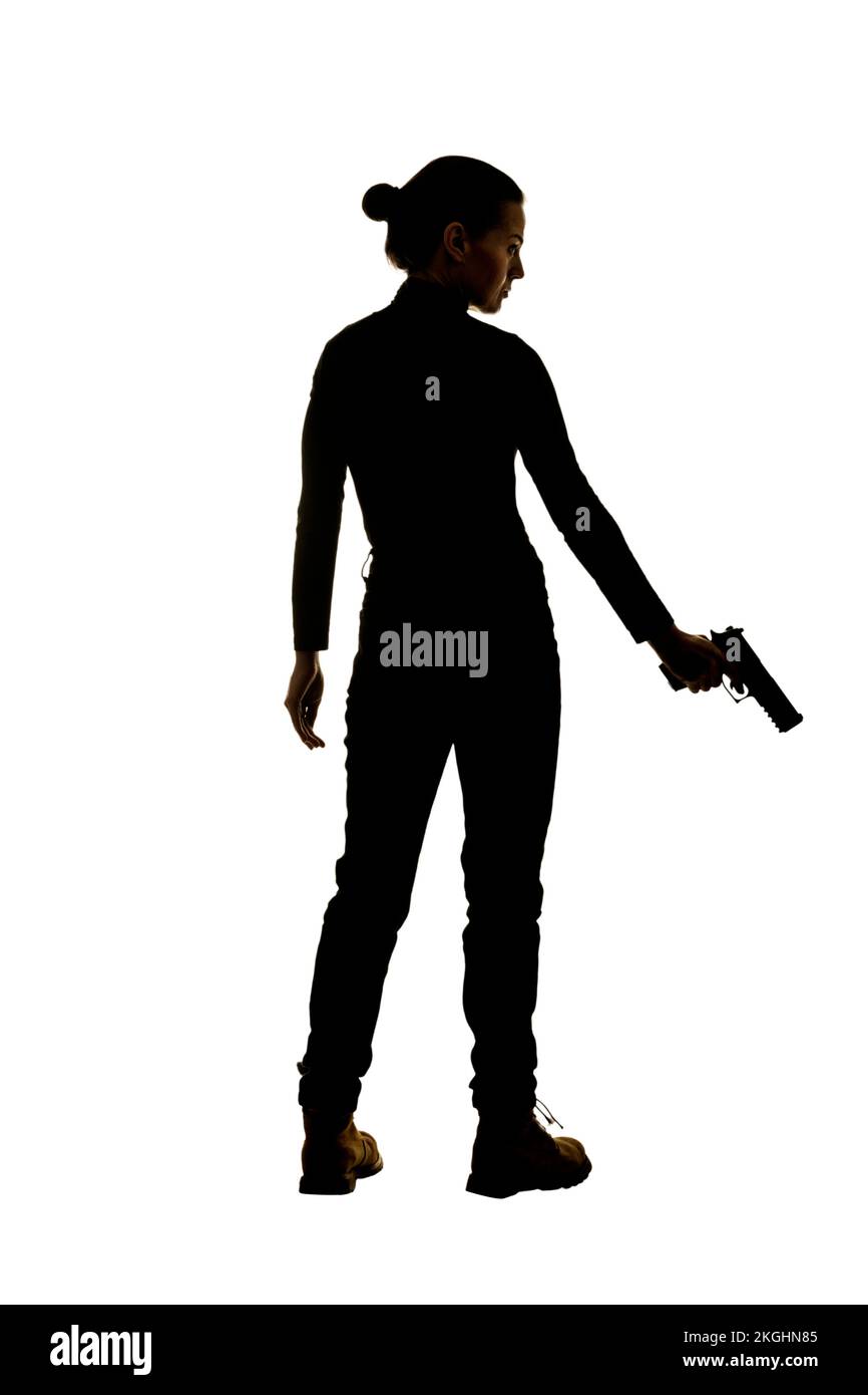 Demi-shilouette d'une femme tenant un fusil Banque D'Images