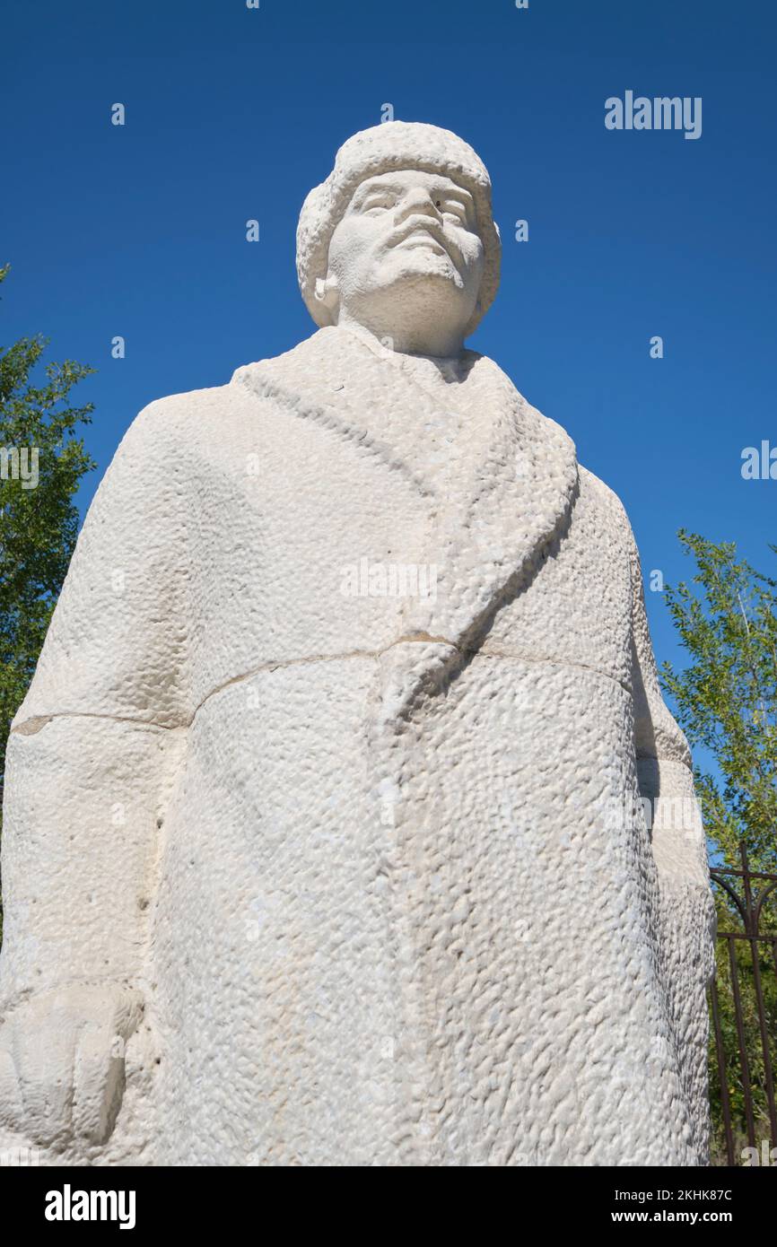 Marbre sculpté, sculpture en pierre, statue du dirigeant communiste Vladimir Lénine, portant un manteau d'hiver lourd et un chapeau. Au Musée des victimes de Pol Banque D'Images