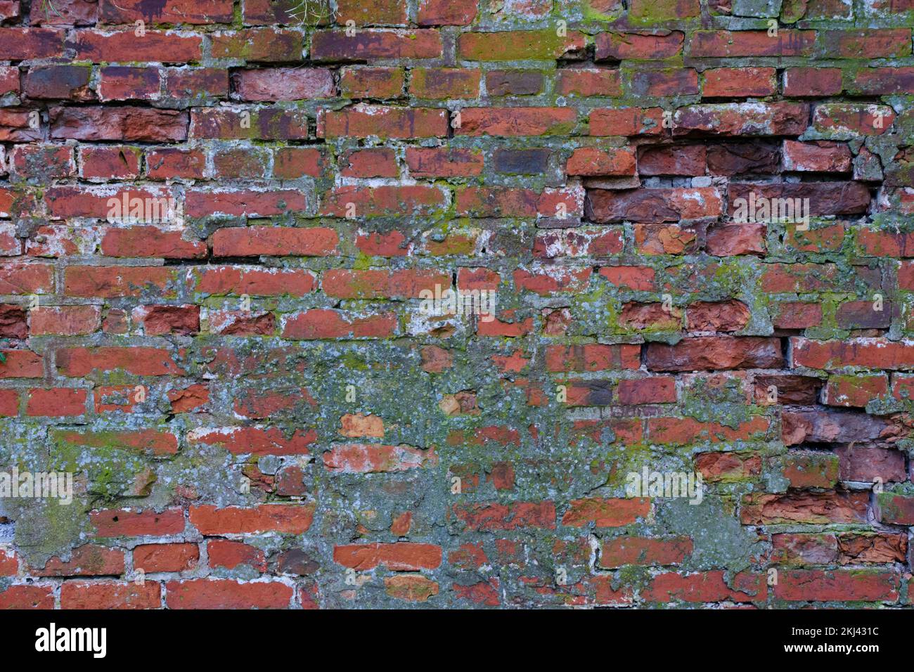 Mur de fond abstrait de vieux briques rouges en ruines Banque D'Images
