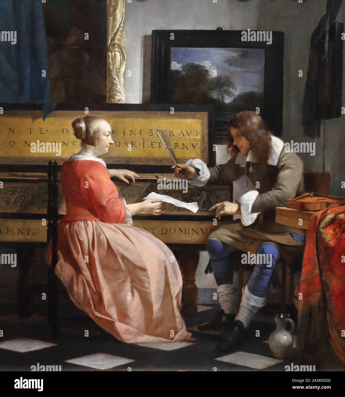 Un homme et une femme assis par un Virginie par le peintre hollandais Gabriel Metsu à la National Gallery, Londres, Royaume-Uni Banque D'Images