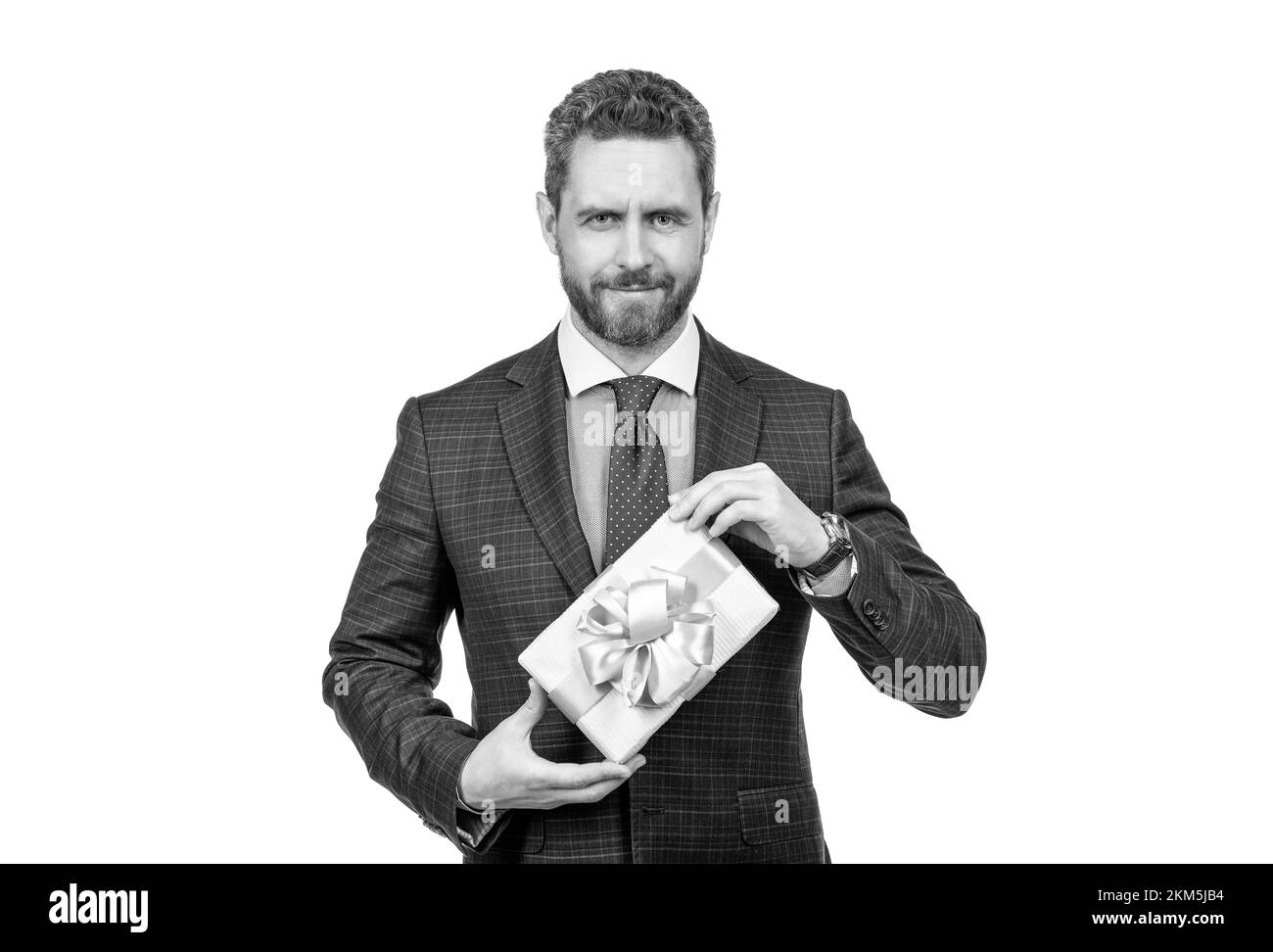 cadeau pour la fête des femmes. le chef de la direction tient sa boîte-cadeau. homme beau se prépare pour la date romantique Banque D'Images