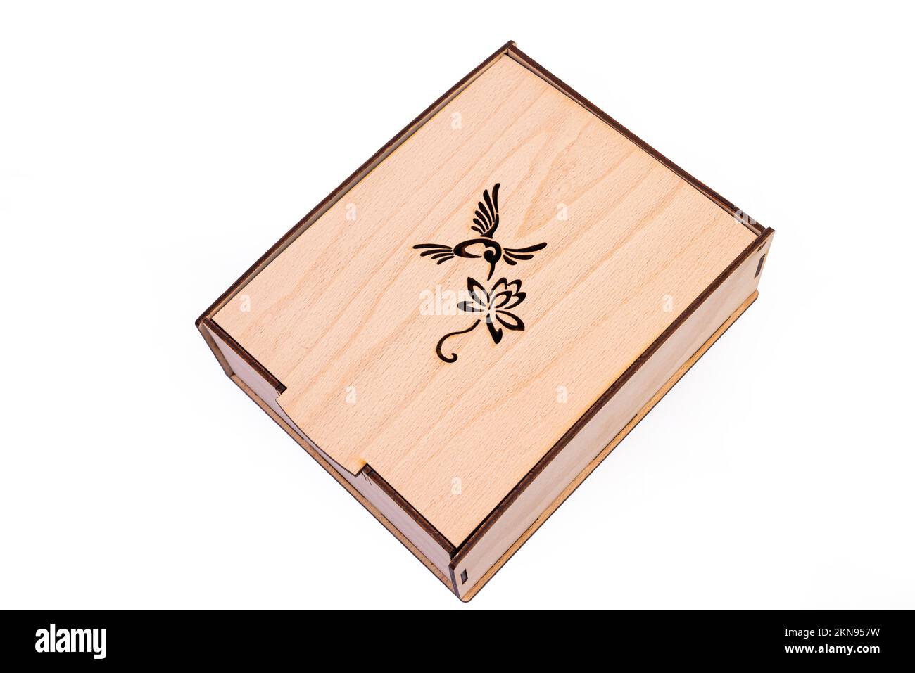 Vitamines et produits biologiques dans le cadeau. Miel dans un pot avec un bâton et des bougies de cire. Cadeau dans une boîte isolée sur blanc Banque D'Images