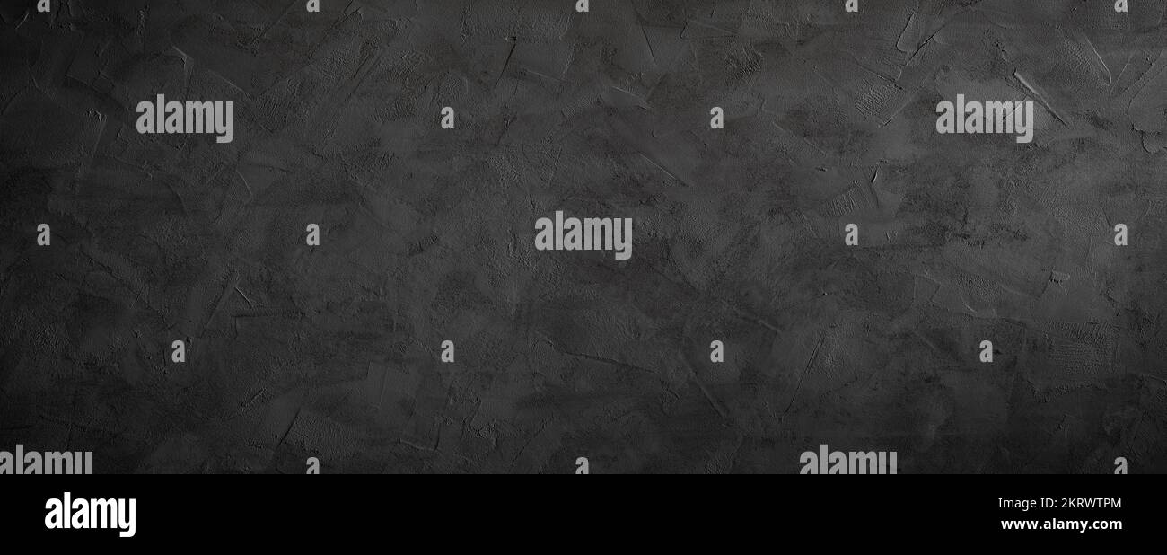 Arrière-plan noir ou gris foncé de texture de pierre grenée Banque D'Images