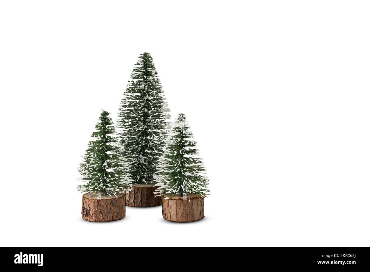 Petits arbres de Noël isolés sur fond blanc. Banque D'Images