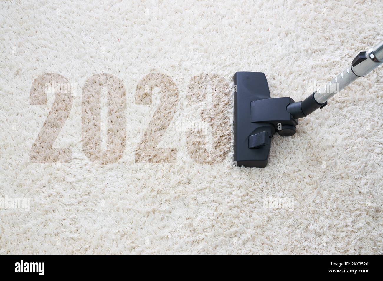 nettoyage à la maison avec aspirateur et espace de copie pour un texte, nouvel an 2023 Banque D'Images