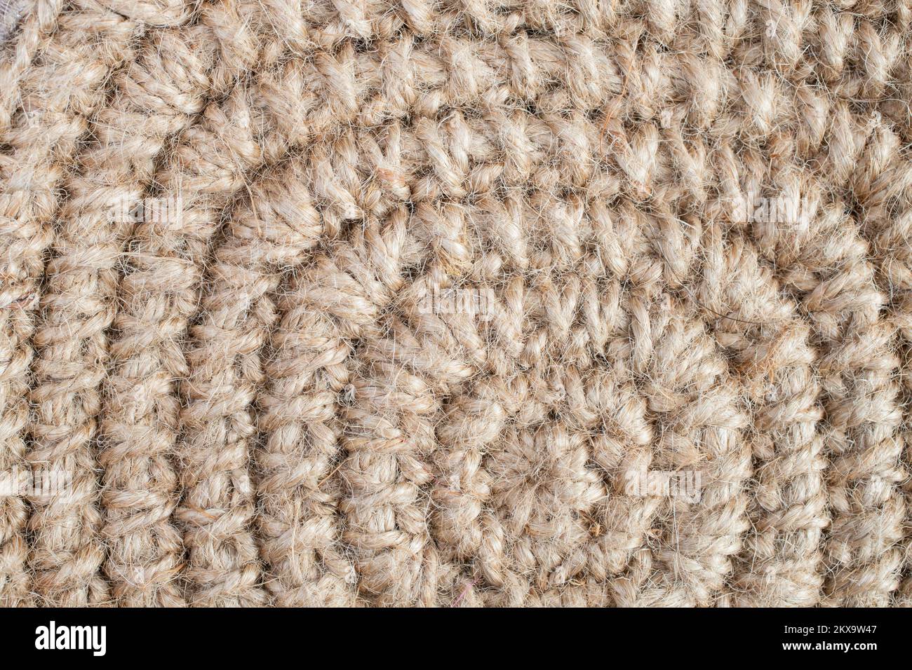 Motif en crochet de corde de jute, forme en spirale gros plan Banque D'Images