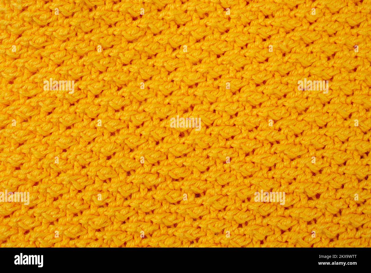 Motif en crochet jaune, gros plan sur toile de fond Banque D'Images