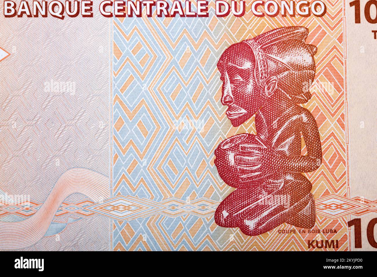 Luba sculptant de l'argent congolais - franc Banque D'Images