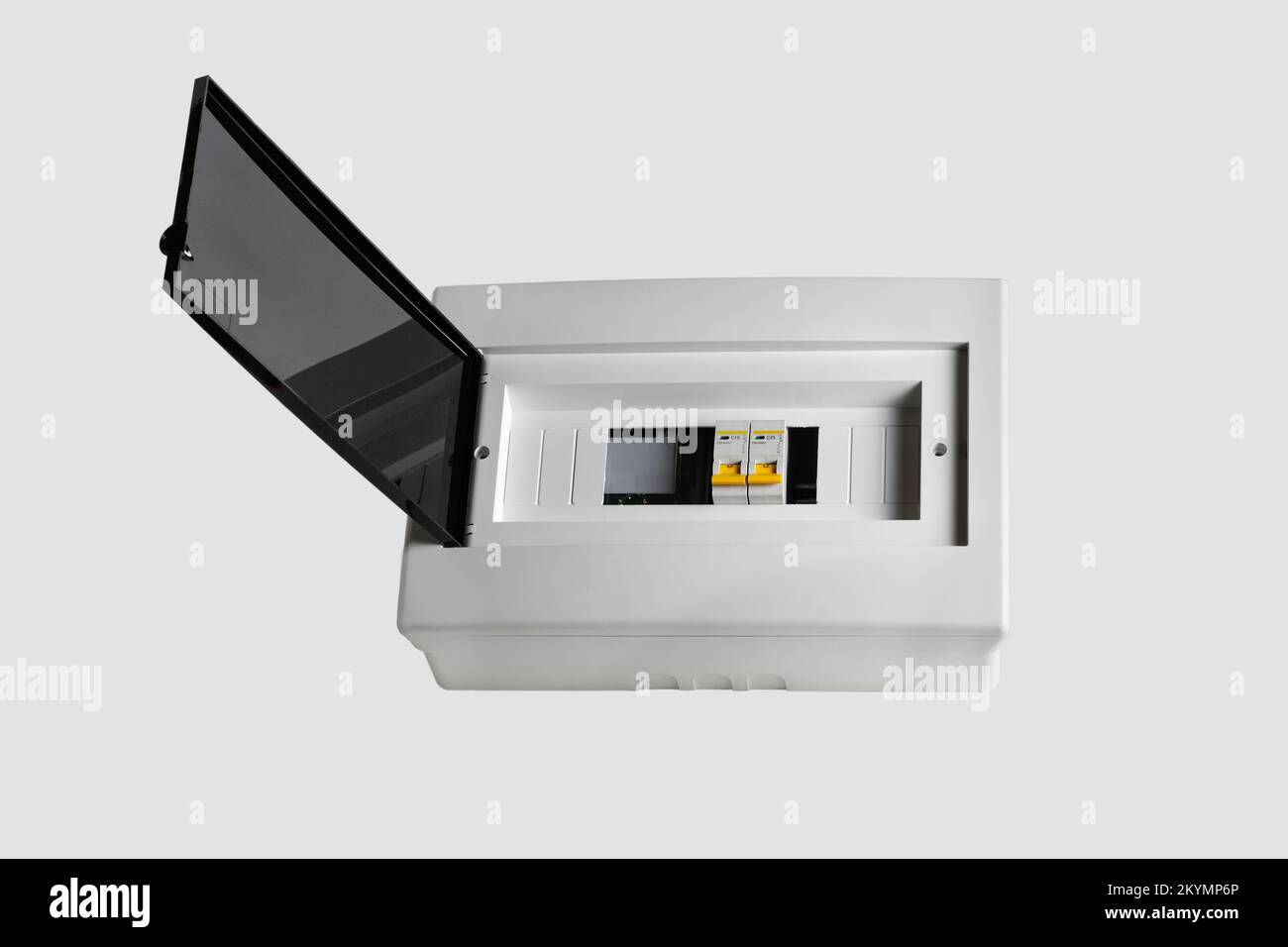 Tableau de distribution en plastique. Carte électrique. Gros plan. Isolé sur fond gris clair. Banque D'Images
