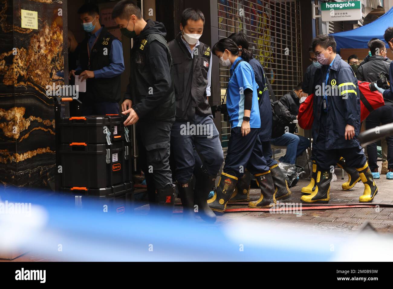 Deux personnes sont mortes et plus de 20 personnes ont été évacuées après l'incendie survenu dans la maison Kam Lok, sur le chemin Lockhart, à WAN Chai, dans les premières heures de jeudi. DEC0122 SCMP/ May TSE Banque D'Images