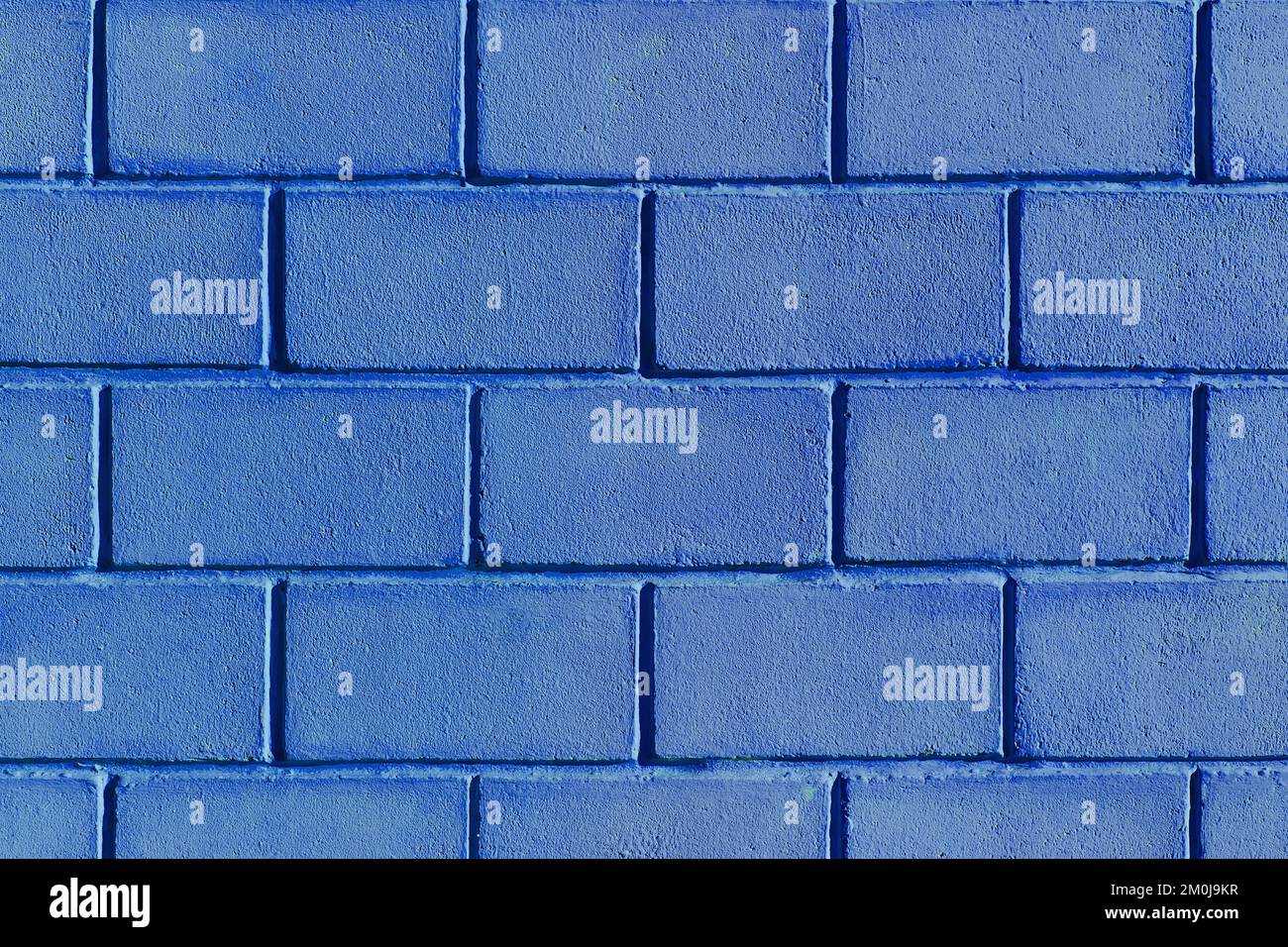 Peinture bleue mur briques blocs extérieur façade texture arrière-plan maison abstraite maison. Banque D'Images