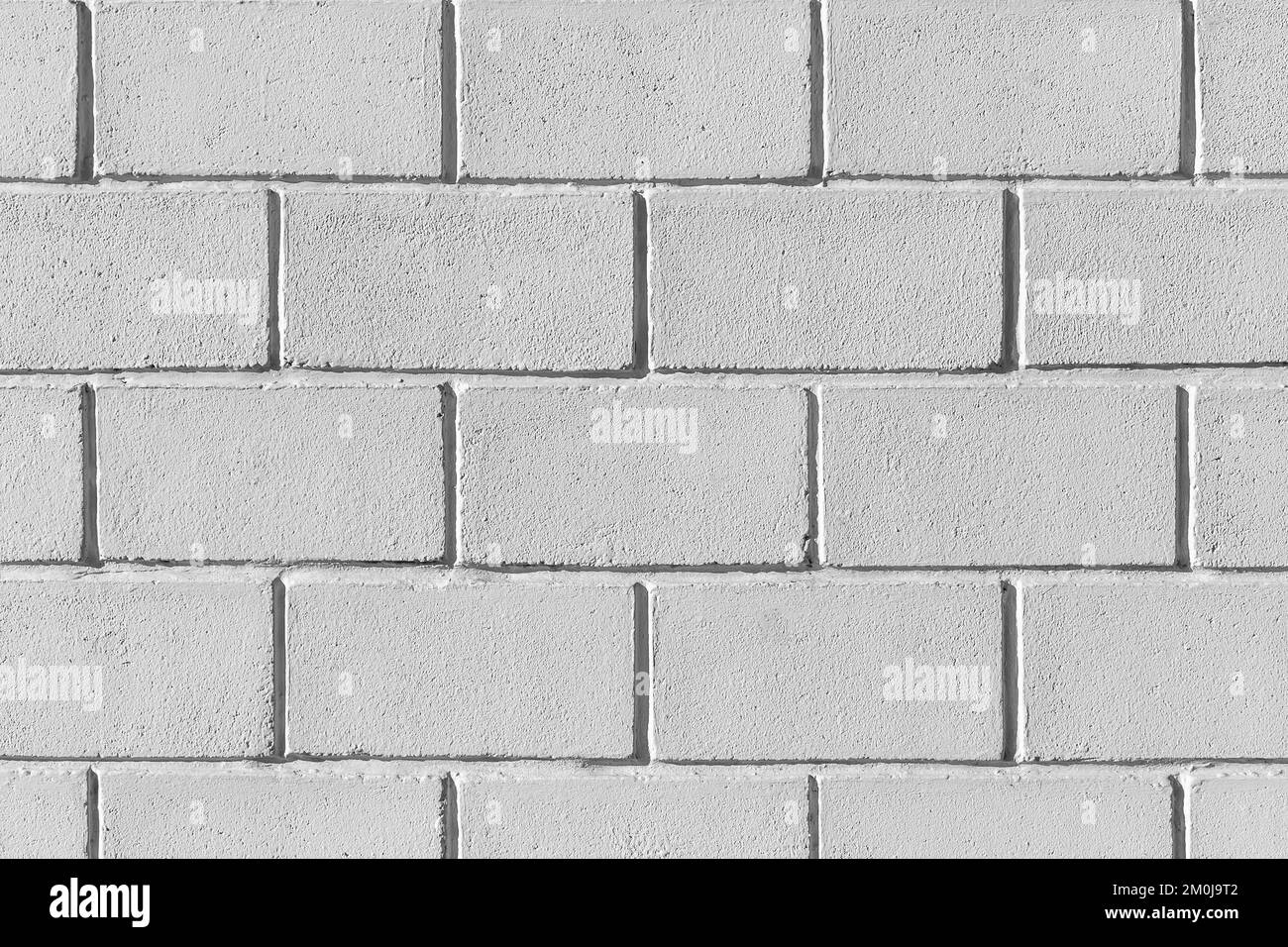 Blanc gris peinture mur briques blocs extérieur façade texture arrière-plan maison abstraite maison. Banque D'Images