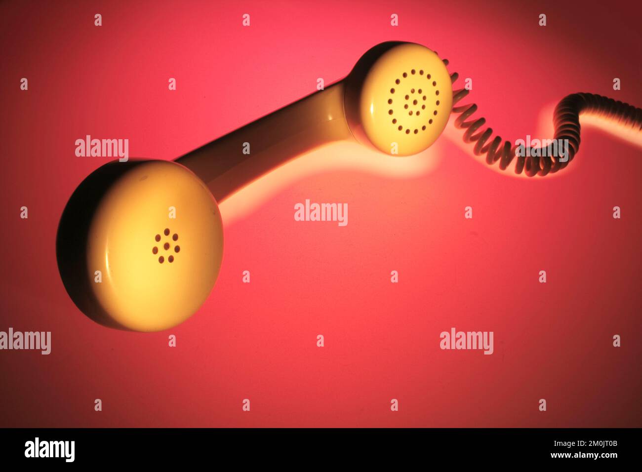 Récepteur téléphonique sur fond chaud Banque D'Images