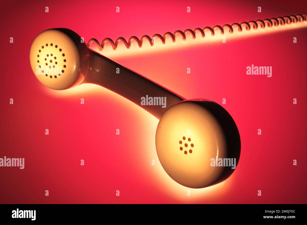 Récepteur téléphonique sur fond chaud Banque D'Images