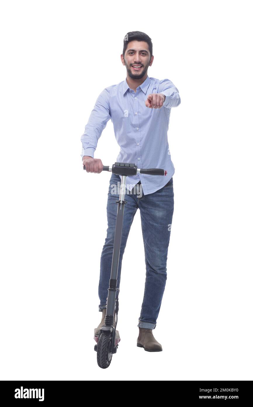 en pleine croissance. jeune homme heureux avec un scooter électrique Banque D'Images