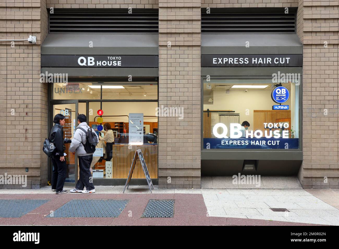 QB House, 942 Broadway, New York, New York, New York photo d'une chaîne de barbershop dans le quartier Flatiron de Manhattan. Banque D'Images