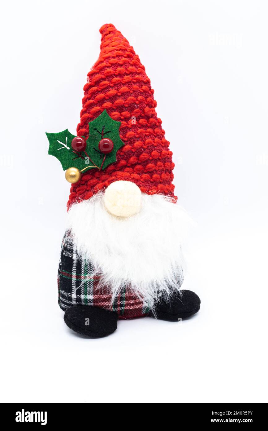 Gnome de Noël avec chapeau rouge à part. Banque D'Images