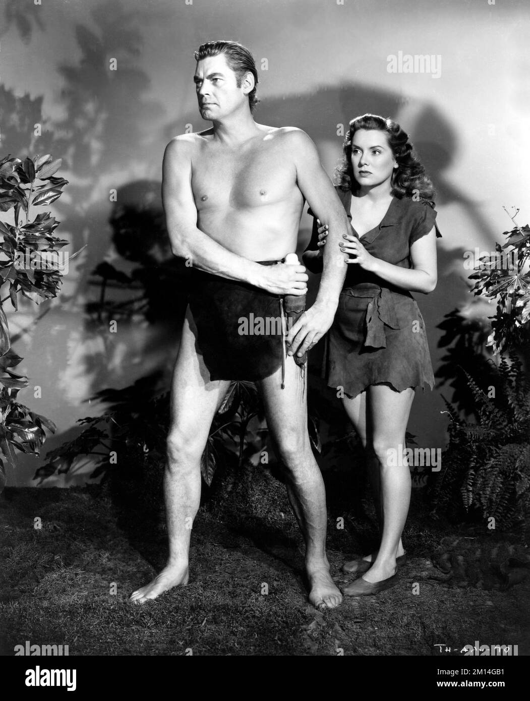 JOHNNY WEISSMULLER et BRENDA JOYCE à TARZAN ET THE HUNTRESS (1947), dirigé par KURT NEUMANN. Crédit : RKO / Album Banque D'Images