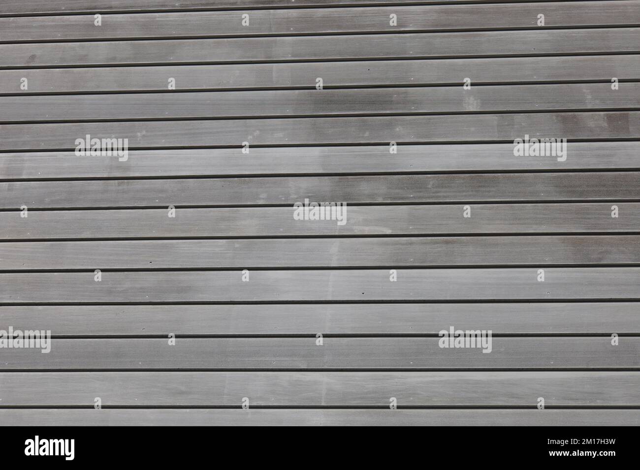 Parement en bois d'un bâtiment avec éclairage naturel Banque D'Images