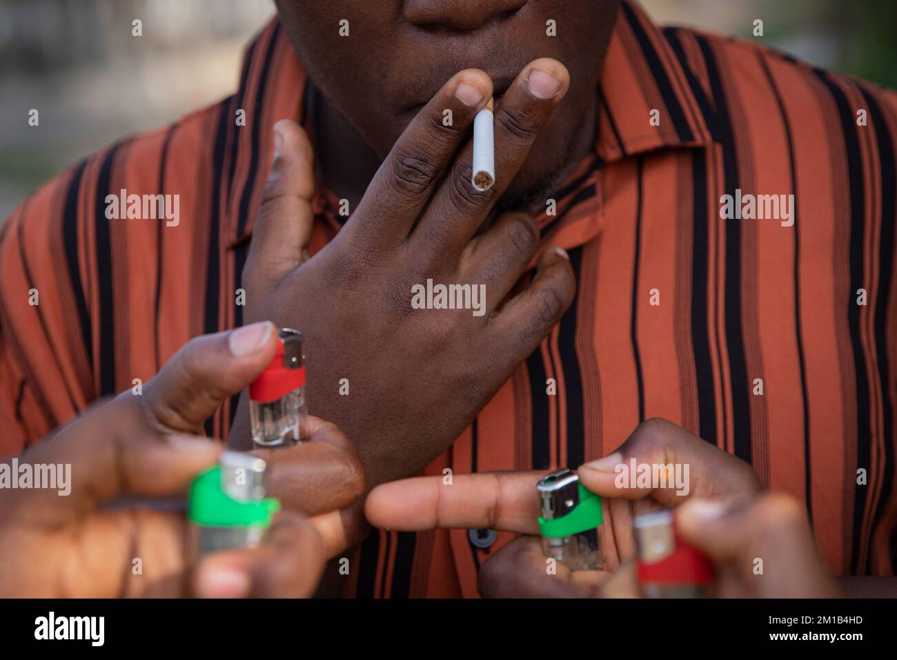 With a cigarette in his mouth Banque de photographies et d'images à haute  résolution - Alamy