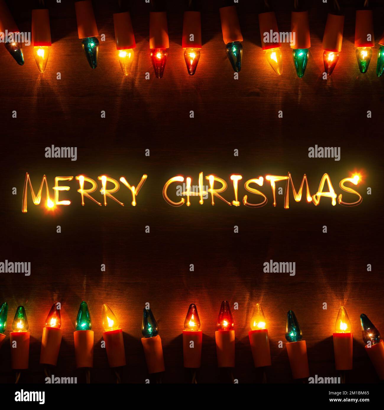 Joyeux Noël. Lumières vintage et lumière de souhaits peints Banque D'Images