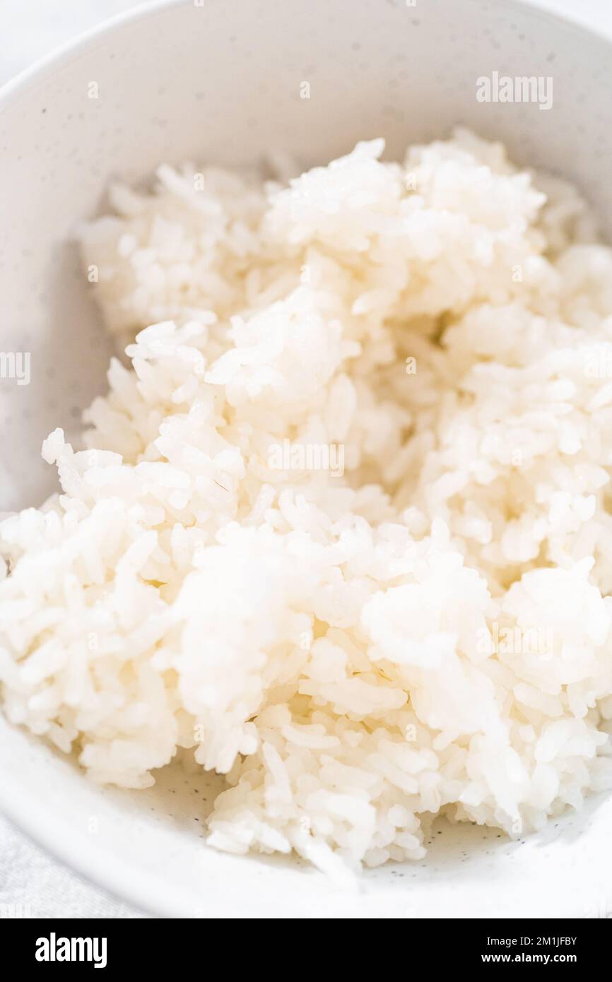 Cuisson du riz Banque D'Images Cuisson du riz Banque D'Images