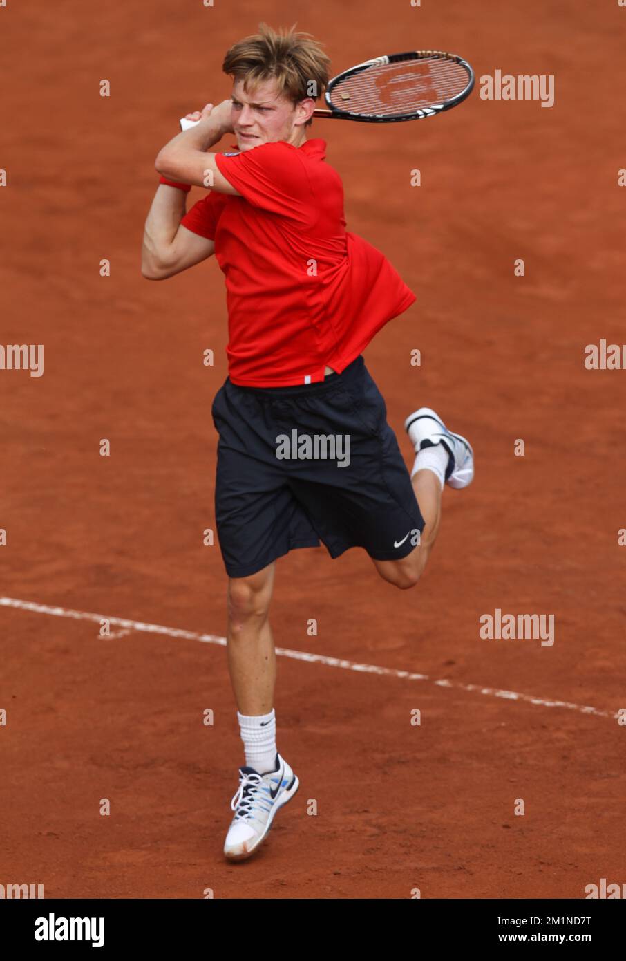 20120914 - BRUXELLES, BELGIQUE: David Goffin belge en action pendant le deuxième match de la coupe Davis entre la Belgique et la Suède, pour le Groupe mondial au Royal Primerose tennis Club à Bruxelles, le vendredi 14 septembre 2012. David Goffin belge (ATP 56) et Andreas Vinciguerra suédois jouent le deuxième des cinq matchs. BELGA PHOTO VIRGINIE LEFOUR Banque D'Images