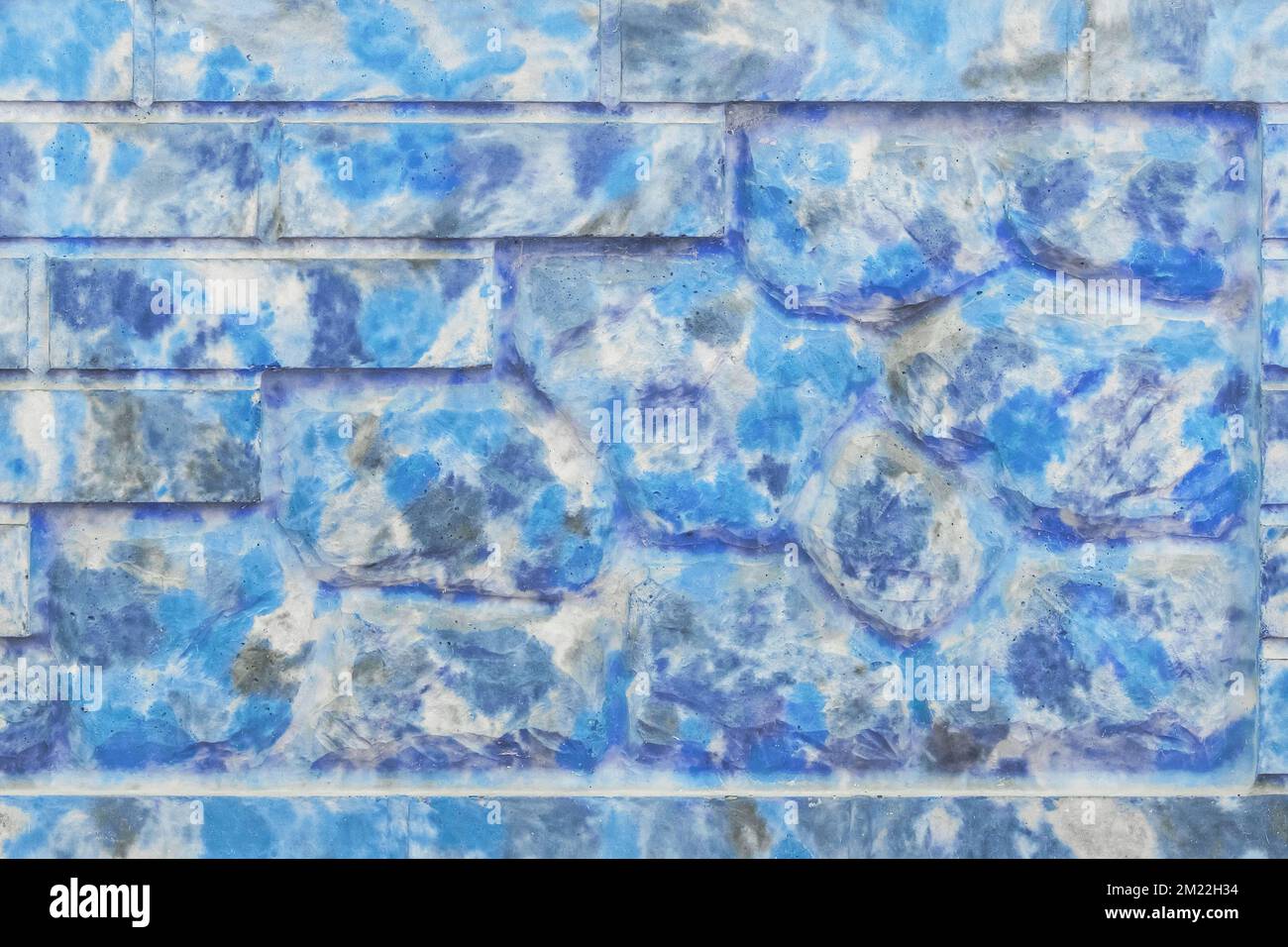 Clôture décorative en pierre de brique abstraite bleu à pois motif de peinture moderne intérieur texture de mur arrière-plan. Banque D'Images