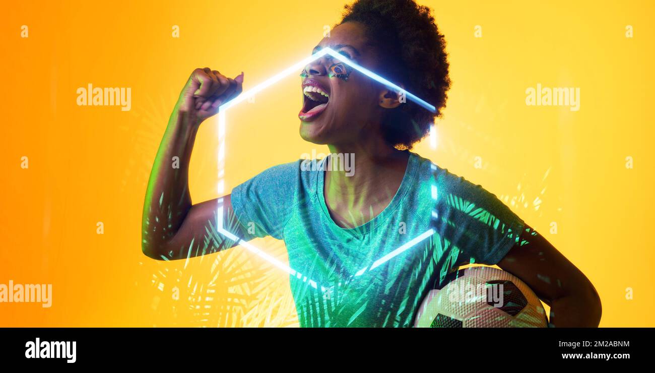 Plantes et hexagone sur une femme afro-américaine criant avec la peinture du visage du drapeau brésilien Banque D'Images