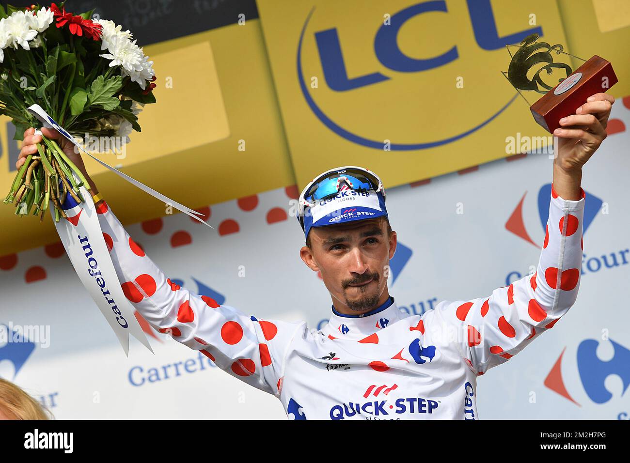 Julien Alaphippe français des étages Quick-Step célèbre sur le podium en  maillot rouge à pois pour le meilleur grimpeur après la phase 18th de  l'édition 105th de la course cycliste Tour de