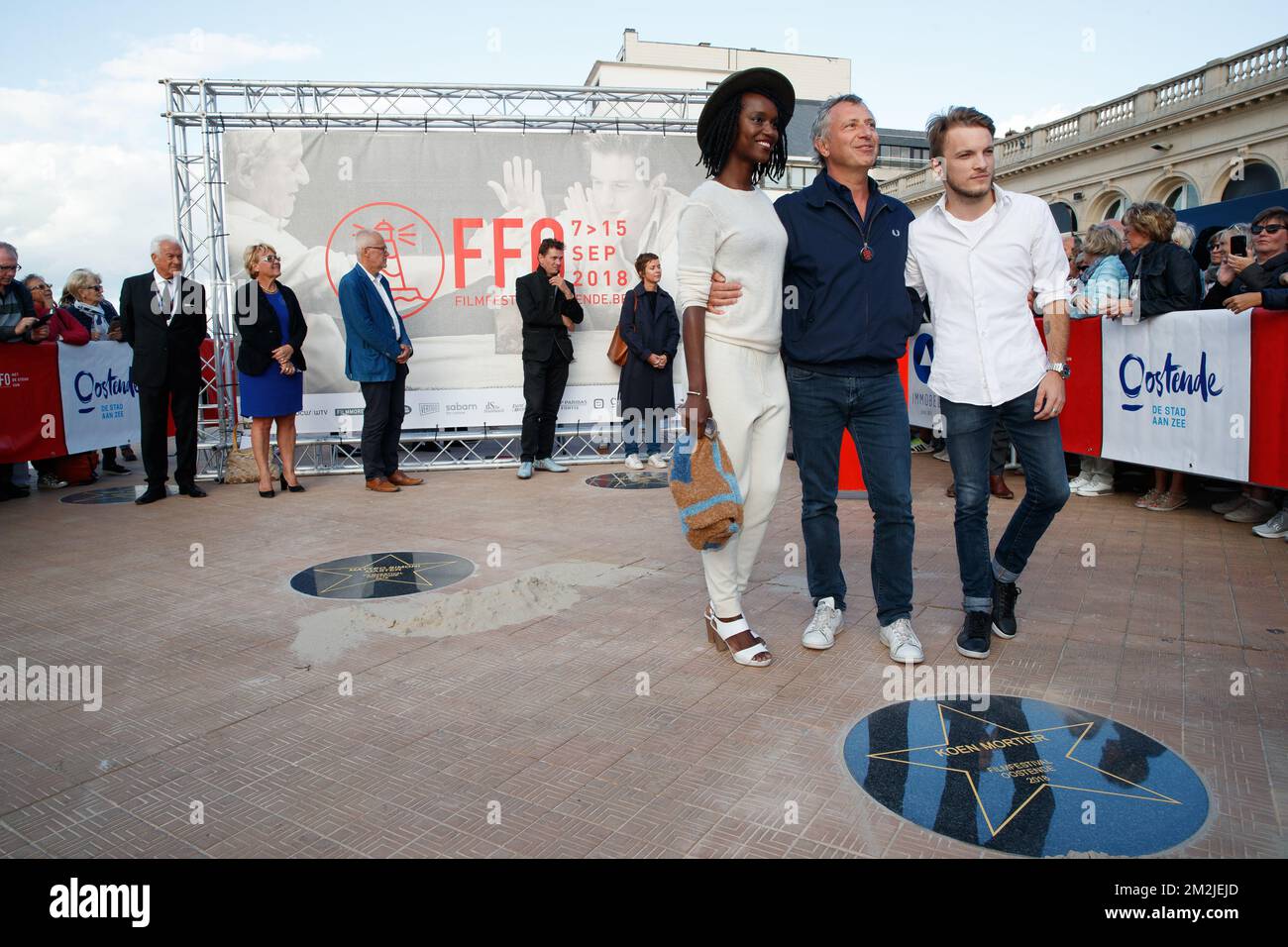 L'actrice française Fatou n'Diaye, le réalisateur Koen Mortier et l'acteur Vincent Rottiers photographiés lors de la soirée d'ouverture de l'édition 12th du festival du film d'Ostende, vendredi 07 septembre 2018. BELGA PHOTO KURT DESPLENTER Banque D'Images