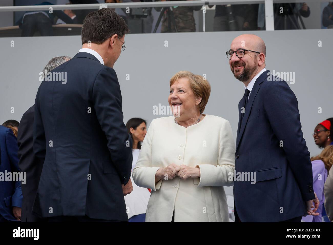 Le Premier ministre des pays-Bas, Mark Rutte, la chancelière allemande Angela Merkel et le Premier ministre belge Charles Michel, photographiés lors du défilé militaire de la Journée nationale française, à Paris, le dimanche 14 juillet 2019. BELGA PHOTO THOMAS PADILLA Banque D'Images