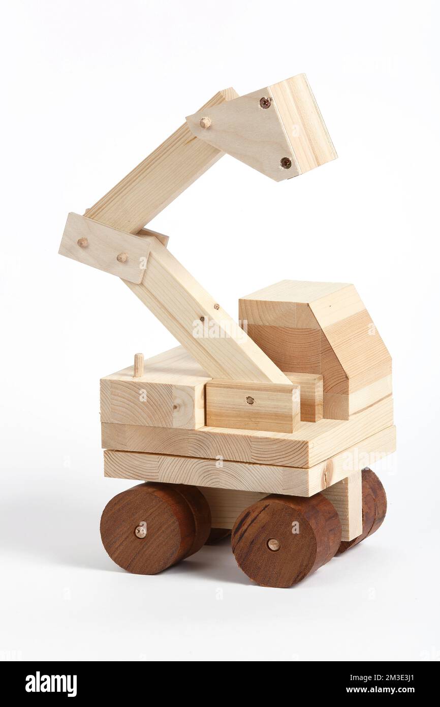 jouets en bois faits main dans le fond simple Banque D'Images