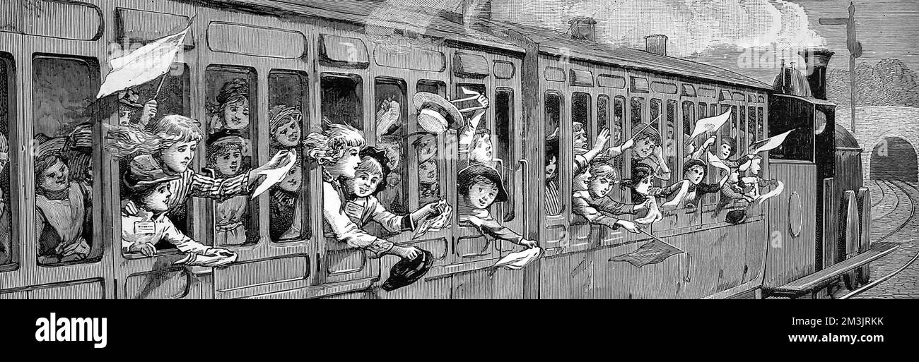 Les enfants à bord d'un train partent en voyage scolaire Banque D'Images